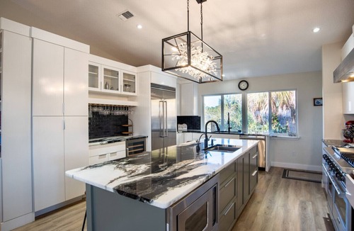 Woods N Waters House | Canal Front|Screened Pool|Dock|Firepit|Dog OK|Sleeps 9