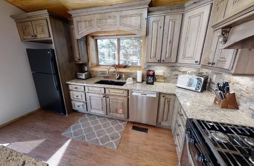 Red River House | Caribel Trail Lodge - In Town -