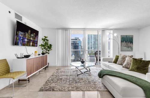 East Little Havana Apartment | Central 2 bed Apartment with a Pool & Gym- Free Garage Parking