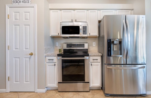 Sandalwood House | Centralized, stylish getaway. Short drive to beach, shopping, downtown, Mayo!