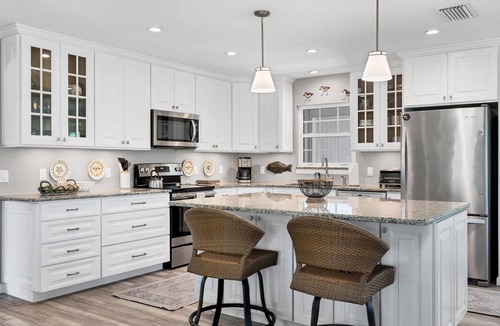 Boca Grande House | Charming 2BR home with pool view in Boca Grande's North End, perfect for relaxation.
