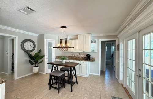 Venice Gardens House | Charming 3BR/2BA Venice center located, screened/heated pool