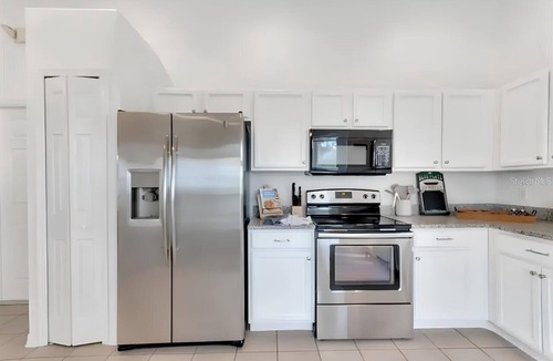 Windsor Palms House | Charming 4bed with Private Pool, Jacuzzi, A/C, WiFi, Cable TV– 5 Min from Disney