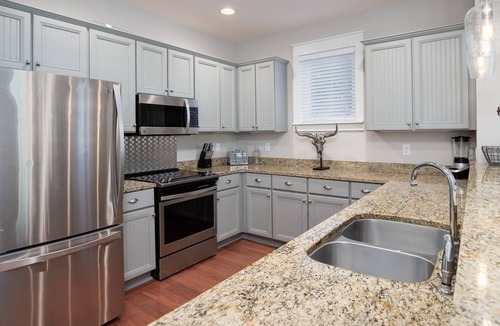 Laurel Grove House | Charming Beach Cottage, 2 Golf Carts! Beautiful Views, Pool, Hot Tub, Fitness