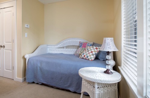 Laurel Grove House | Charming Cottage! 2 Golf Carts, Near the Pool & Hot Tub, Beach Tram Included!