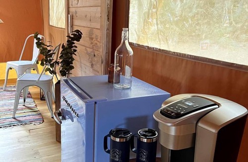 Highland RV Rental | Charming Safari Tent for Group Glamping in Nature in Basinger, Florida