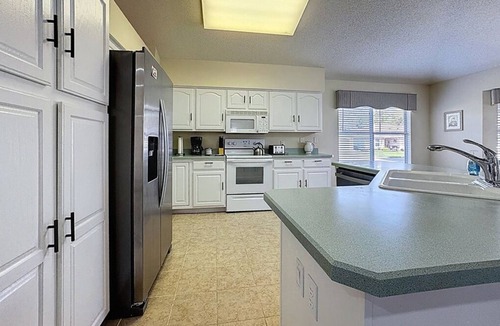 The Villages Villa | Charming Villa with Golf Cart: Steps from Spanish Springs & Shopping!