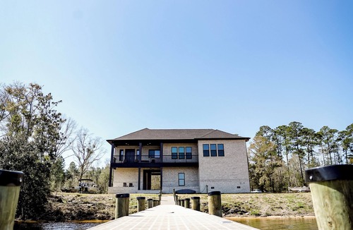 Bagdad House | Charming waterfront 3-bedroom, 3 bath house with gourmet kitchen in Milton, FL