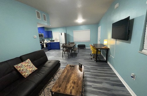 Southwest Orlando House | Cheerful 3 Bed home w/free parking, Wifi, Full Kitchen & Workstation. Sleeps 9