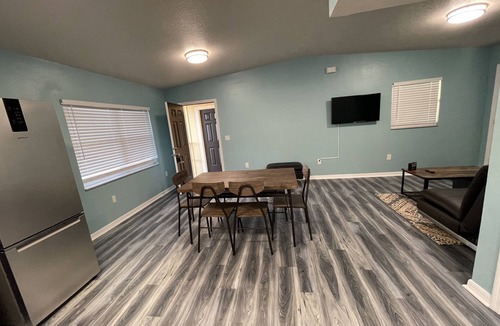 Southwest Orlando House | Cheerful 3 Bed home w/free parking, Wifi, Full Kitchen & Workstation. Sleeps 9
