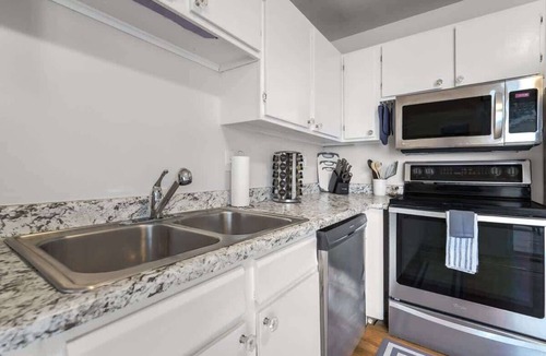 Village Seven Apartment | Cheerful Chalet! Centrally Located w BBQ Pit