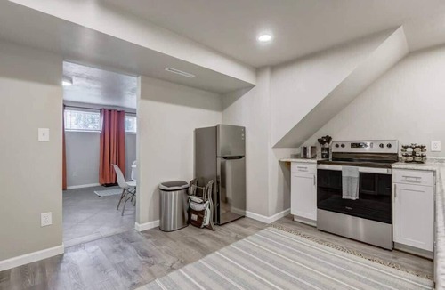 Village Seven Apartment | Cheerful Cove - Cozy Basement Centrally Located