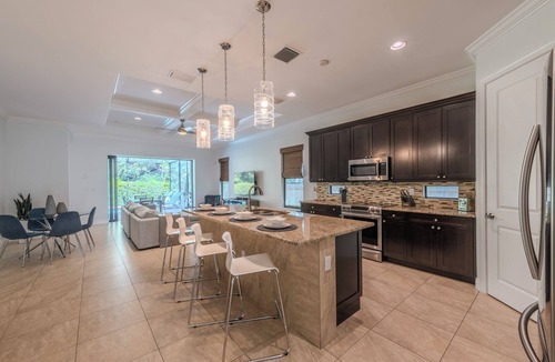 Naples Park House | Coastal Clean Design 4 Bedroom/2 Bath + Saltwater Pool & Screened Lanai