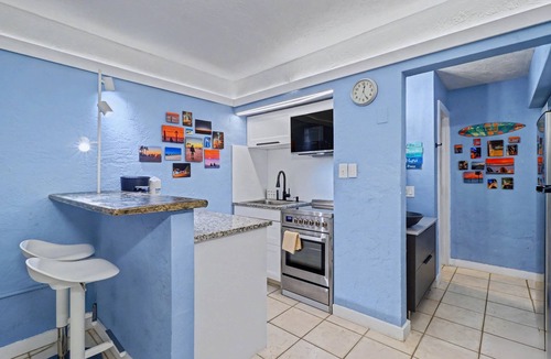 Pass-a-Grille Historic District House | Coastal dog friendly condo with observation deck best Gulf sunset views