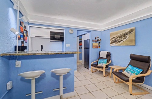 Pass-a-Grille Historic District House | Coastal dog friendly condo with observation deck best Gulf sunset views