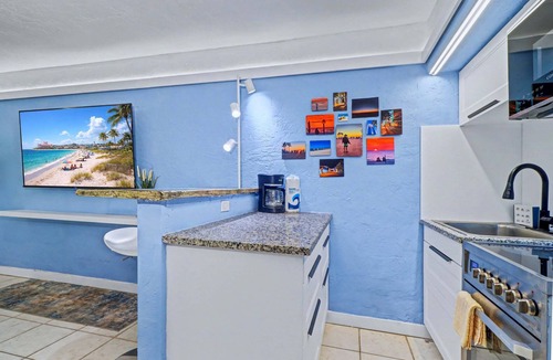 Pass-a-Grille Historic District House | Coastal dog friendly condo with observation deck best Gulf sunset views