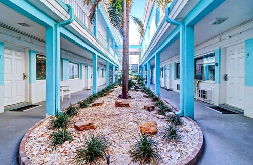 Pass-a-Grille Historic District House | Coastal dog friendly condo with observation deck best Gulf sunset views