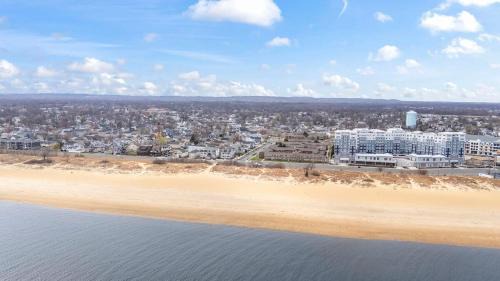 Almont House | Coastal Escape - New Build with Patio and Yard