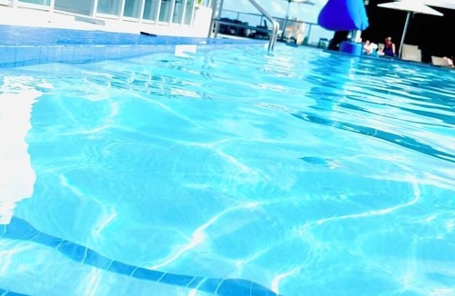 Hollywood Condo | CONDO @Hollywood BEACH ✦Rooftop POOL and HOT Tub ✦STEPS to BEACH ✦ PET Friendly!