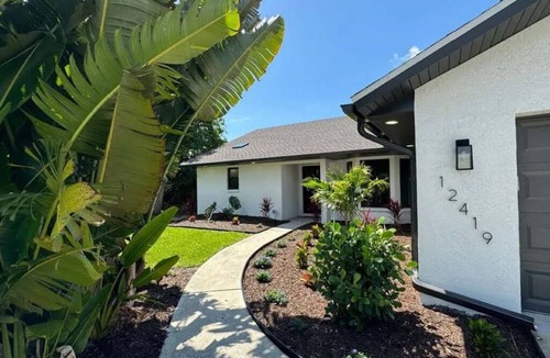 Gulf Cove House | Cozy and private waterfront retreat with hot tub, grill, deck, and firepit!