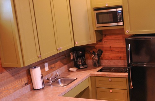 New Braunfels Cabin | Cozy Cabins near the Comal River- Cabin #2- Military Theme. Walk to Wurstfest