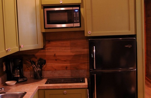 New Braunfels Cabin | Cozy Cabins near the Comal River- Cabin #2- Military Theme. Walk to Wurstfest