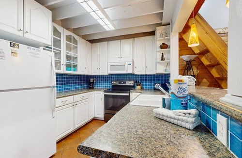St. George Island House | Cozy coastal condo with loft shared pool and beach access