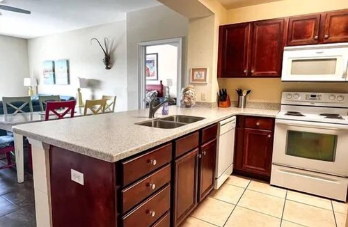 Waterside Village Condo | Cozy Coastal Condo – Walk to Beach, Dine, & Relax!