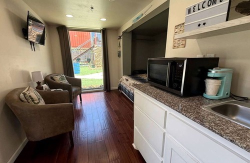 Medicine Park Cabin | Cozy Tiny House with Hammock Patio near Bath Lake in Medicine Park, Oklahoma