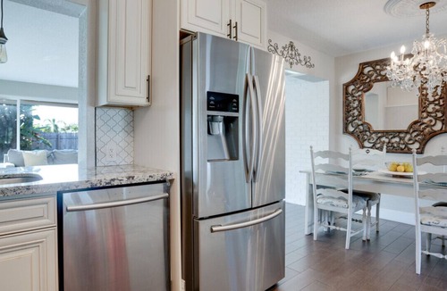 Deerfield Beach House | Cozy Tropical Home w/Heated Pool, Hot Tub & BBQ