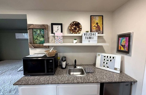 Medicine Park Cabin | Cozy Wheelchair-Friendly Tiny House with Patio near Medicine Creek in Medicine Park, Oklahoma