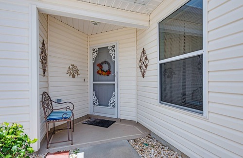 Villas of Greenwood Villa | DARLING 2 BEDROOM VILLA WITH ENCLOSED LANAI LARGE BACKYARD AND GOLF CART