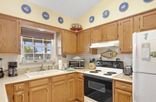 Butler Beach House | Decked Out: Cozy 3 bedroom beach house with Private Pool, screen porch and