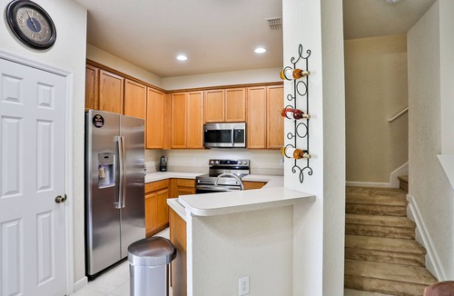 Trafalgar Village House | Delightful lakefront townhome with pool, volleyball, fast WiFi & AC
