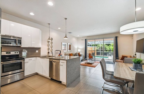 Four Corners House | Discover Serenity in Our Elegant Townhouse Retreat steps away from Disney!