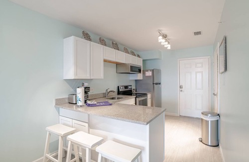 Ono Island Condo | Docks On Old River Overlooks Perdido Key's Beautiful "Ole River" Waterway!