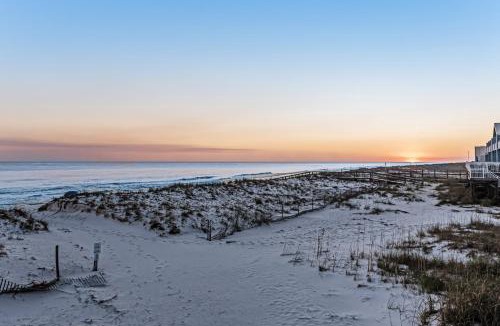 White Sands House | Dog-friendly beachfront dream with a wet bar & two furnished balconies