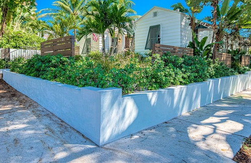 Poiciana Park II House | Dog-friendly home with pool, enclosed yard, patio, central AC, & washer/dryer