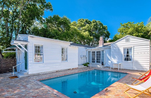 Poiciana Park II House | Dog-friendly home with pool, enclosed yard, patio, central AC & washer/dryer