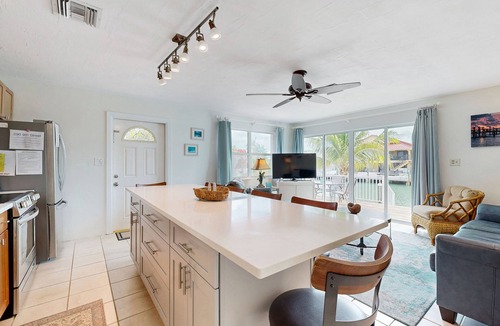 Key Colony Beach House | Dog-friendly waterfront home with dock, pool, gas grill, & beach access