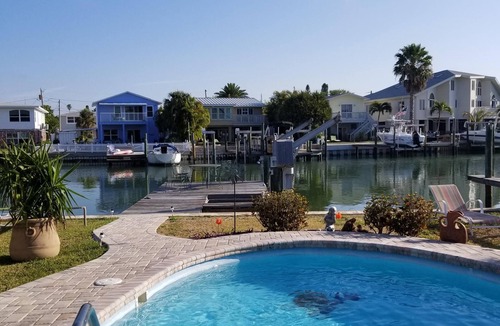 Madeira Beach House | Dolphins and Manatees in Your Backyard!