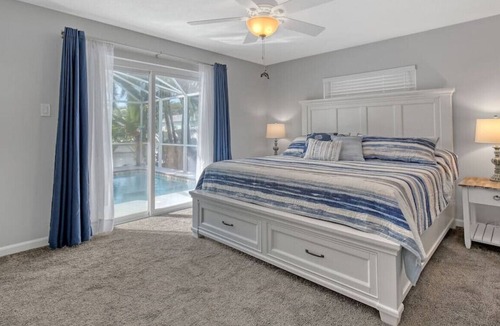 Venetian Way House | Dorset 319 · Paradise Cove-King Master Suite-Swimming Pool
