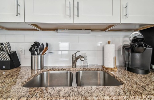 Dunedin Apartment | Dunedin Cottage on Pinellas Trail w/Heated Pool, Walk or Bike to Downtown Dunedin!