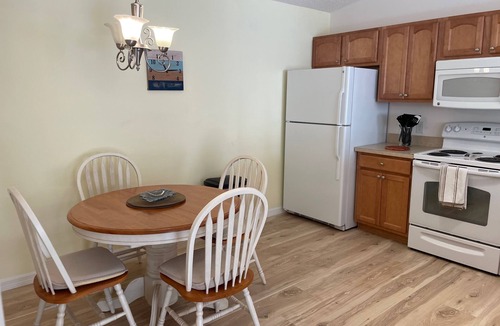Duval House | Duval Hideaway: Lanai Mornings, Breezy Golf-Cart Days, Easy Living.