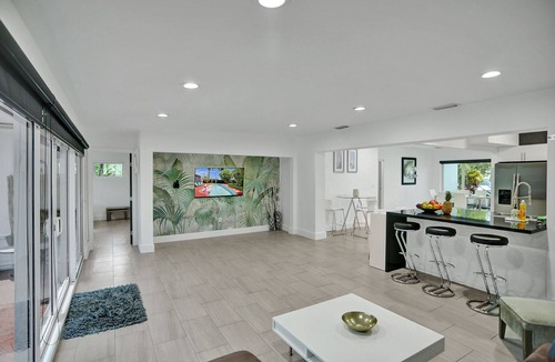 Royal Poinciana House | Elegant House with Pool & Tropical Backyard