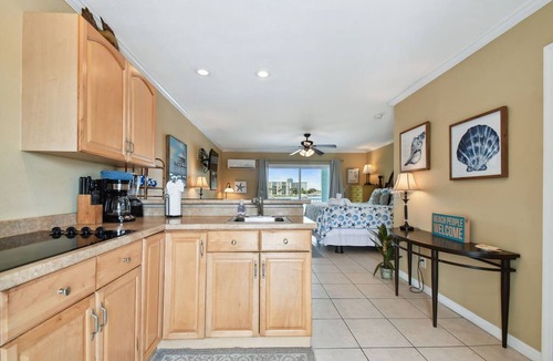 Bay Esplanade Apartment | Enchanted Inn Suite #5: Waterfront, Pool, Fishing Dock, Boat Docks & Tiki Bar!