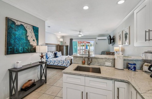 Bay Esplanade Apartment | Enchanted Inn Suite #4: Waterfront, Pool, Fishing Dock, Boat Docks & Tiki Bar!