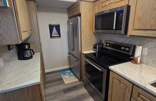 South Padre Island Condo | Enjoy the beautiful water views of the Gulf & Laguna Madre from your rental!