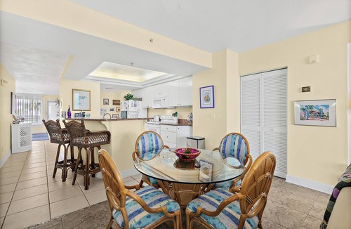 Ponce Inlet Condo | Enjoy this beachfront 2BR condo in Ponce Inlet with a ground-level patio offering direct access to pool and beach. Features a heated pool, fitness room, and clubhouse. Master has a king bed with private bath; guest room includes a king and two twins