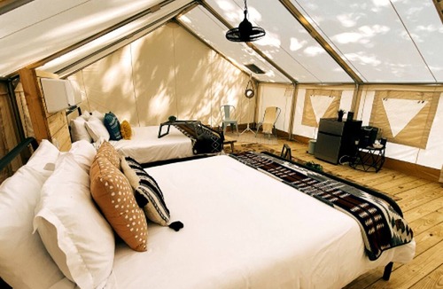 Osprey RV Rental | Enjoyable Secluded Tented Cabin with Fire Pit in Sarasota, Florida